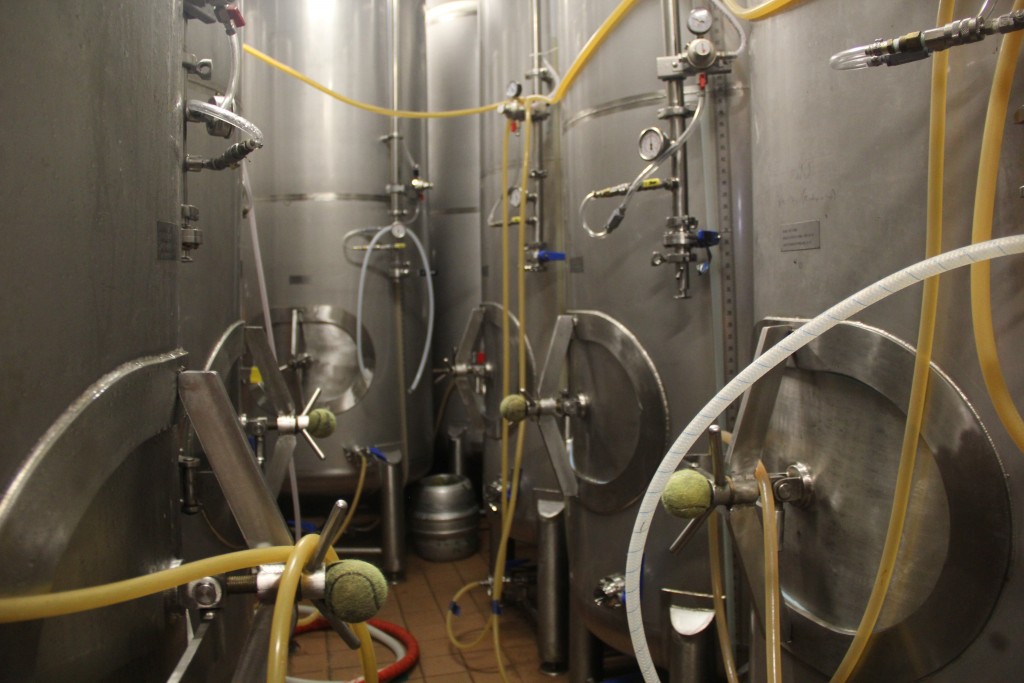 Storing vessels that act as large kegs hold beer until it's served at the tap. Photo by Becca Radix